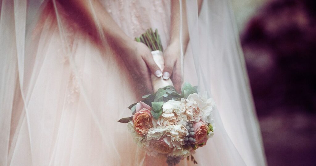 A bride holds a bouquet, illustrating the idea of anima and animus in dreams